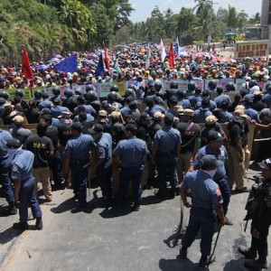 Police positioning themselves too close to the protesting crowd was a flawed tactic.