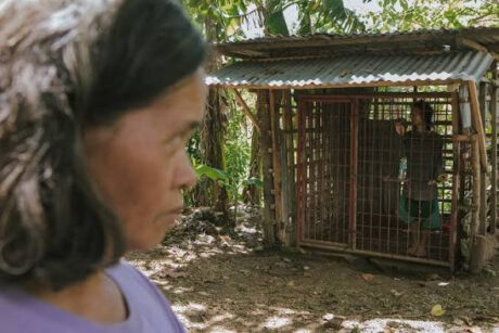 mentally ill person in cage
