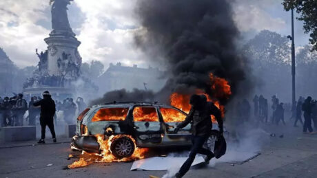Paris riots burning car